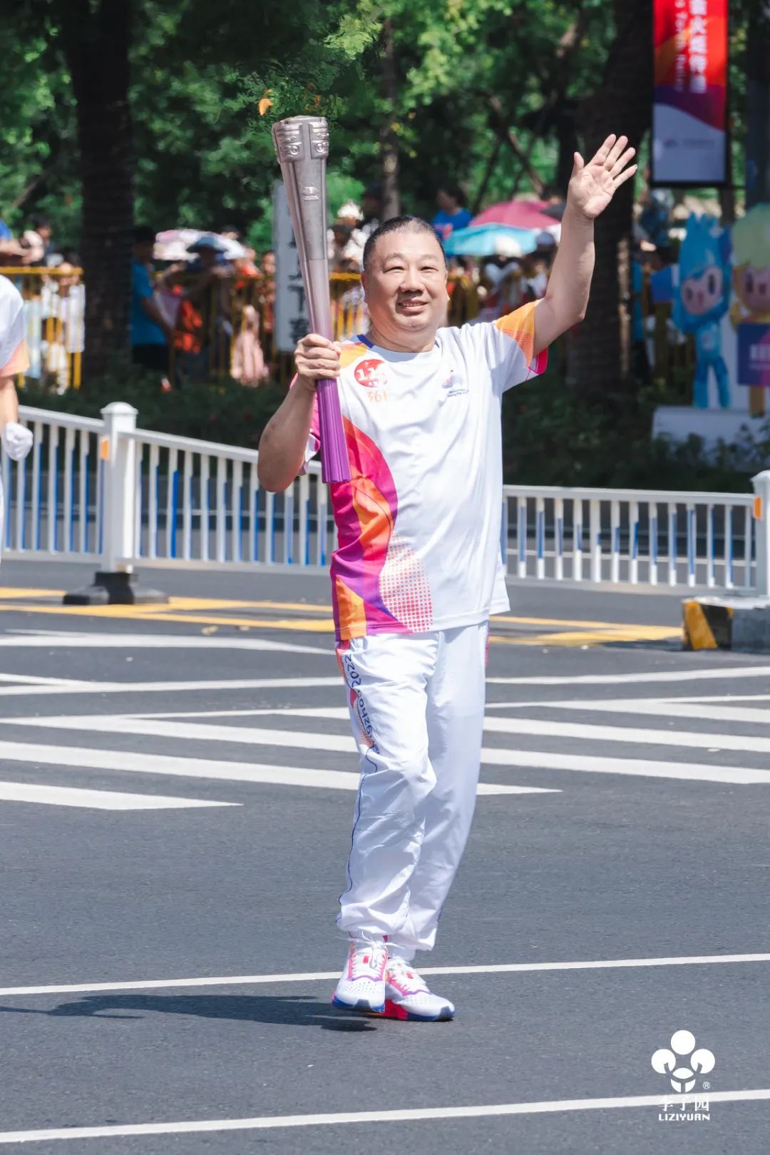 看！亚运火炬传递中的民建面孔